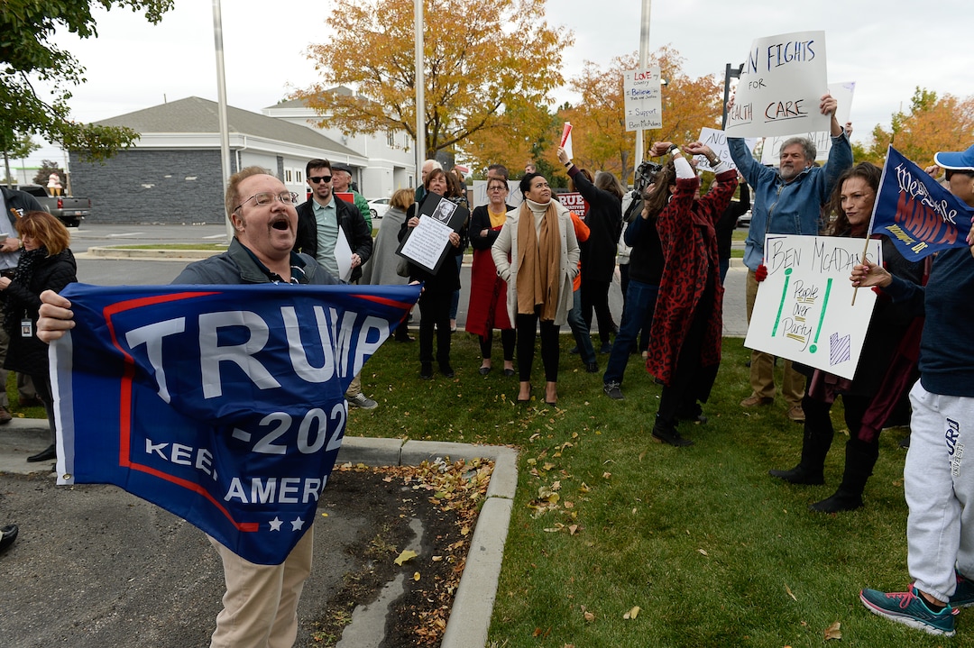 (Francisco Kjolseth | The Salt Lake Tribune) Kevin Howard argues with supporters of the impeachment inquiry as two competing rallies spar near Rep. Ben McAdams' office in West Jordan, one seeking to support McAdams and one to criticize him for supporting the impeachment inquiry of President Donald Trump on Wednesday, Oct. 9, 2019.