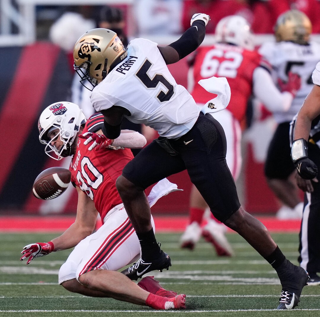 (Francisco Kjolseth | The Salt Lake Tribune) Colorado Buffaloes safety Mark Perry (5) breaks up a pass intended for Utah Utes tight end Brant Kuithe (80) as the University of Utah hosts the Colorado Buffaloes in Pac-12 football, Friday, Nov. 26, 2021 at Rice-Eccles Stadium.