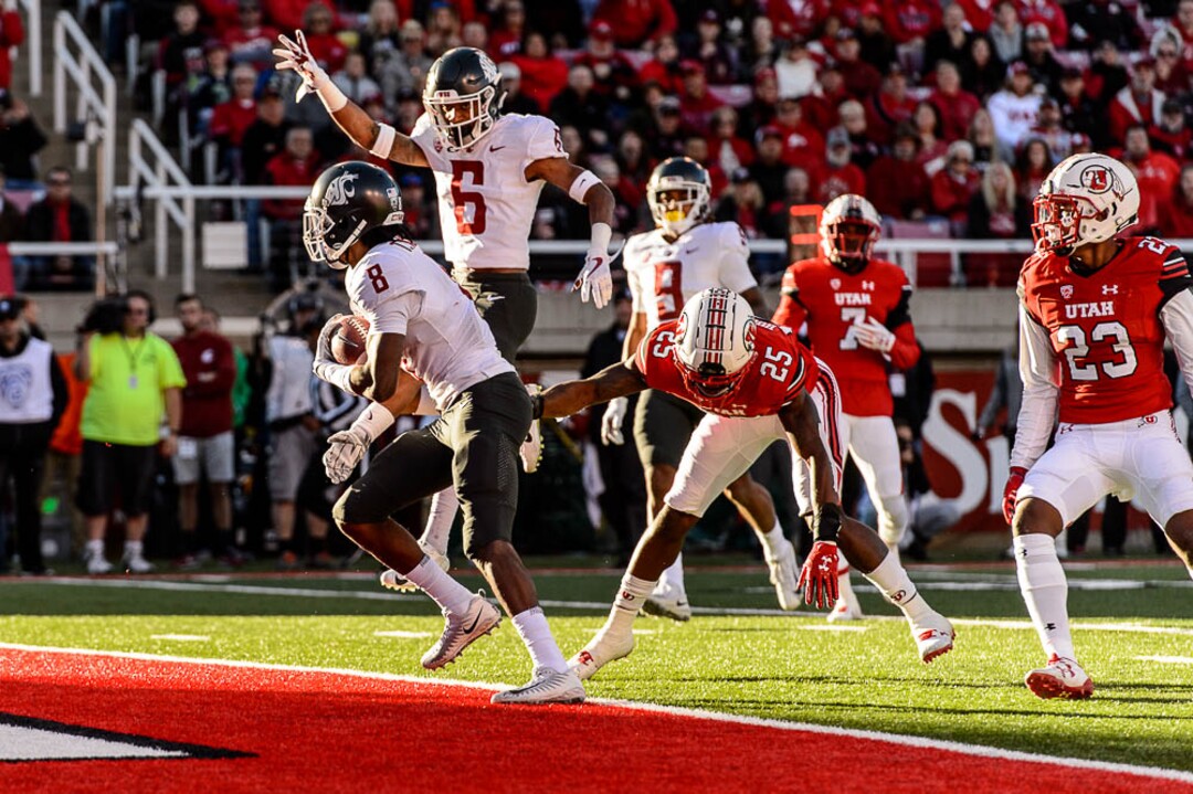 (Trent Nelson | The Salt Lake Tribune)  Washington State Cougars wide receiver Tavares Martin Jr. (8) scores a first quarter touchdown as the University of Utah hosts Washington State, NCAA football in Salt Lake City, Saturday November 11, 2017.