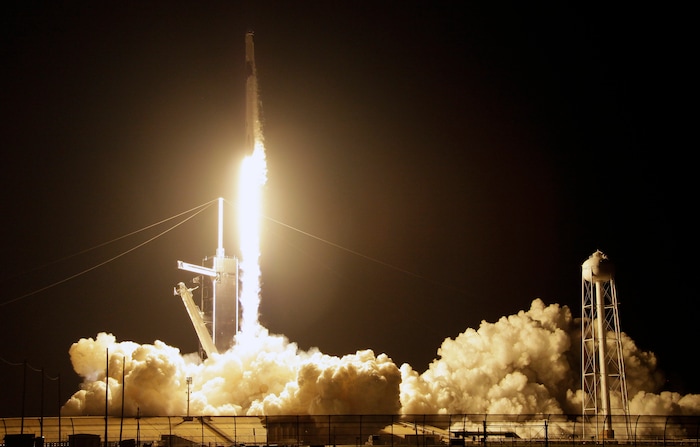 A SpaceX Falcon 9 rocket with a demo Crew Dragon spacecraft lifts off from pad 39A on an uncrewed test flight to the International Space Station at the Kennedy Space Center in Cape Canaveral, Fla., Saturday, March 2, 2019. (AP Photo/Terry Renna)