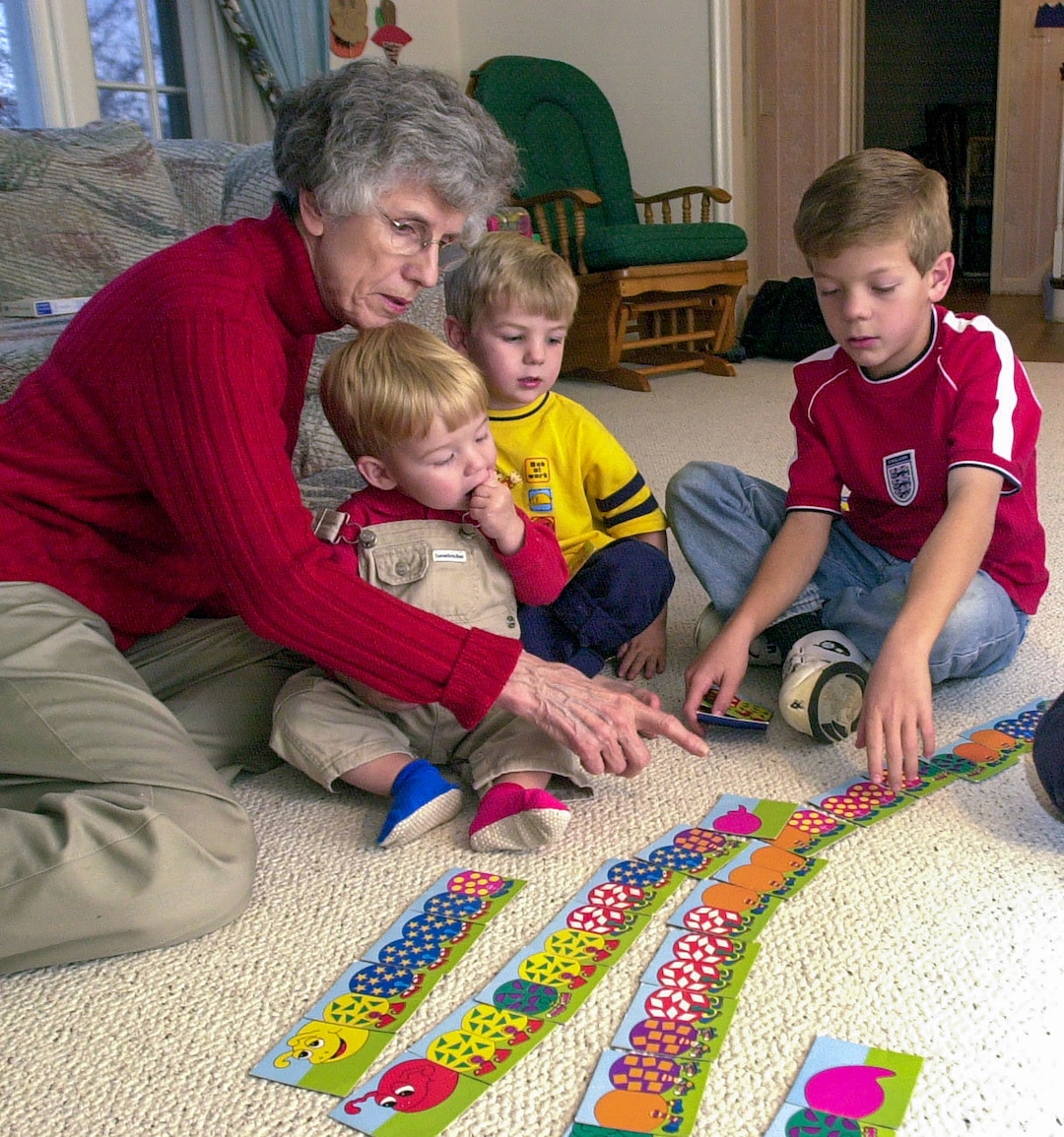 (Ryan Galbraith | The Salt Lake Tribune) Pamela Atkinson plays games with her grandchildren Nate, Will, and Chase in 2001.