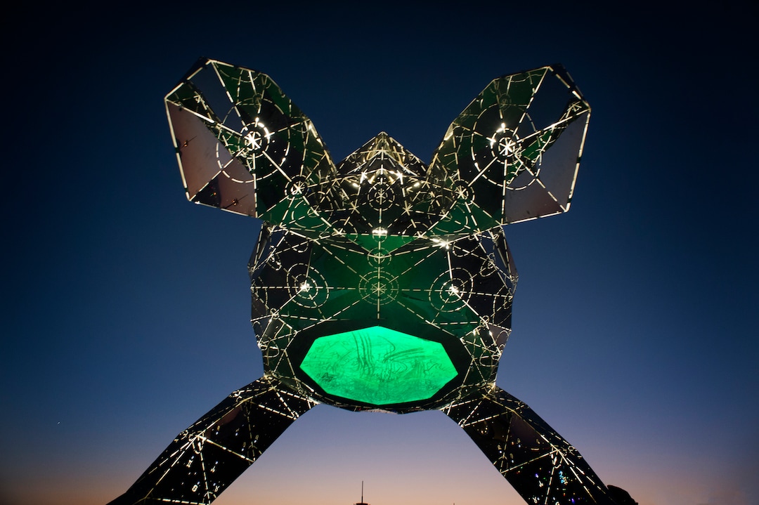 (Rick Egan  |  The Salt Lake Tribune)   A sea turtle made of polished stainless steel titled "Cosmic Voyager" by Martin Taylor and The Chromaforms Collective glows in the evening, at Burning Man, Saturday, Sept. 1, 2018.