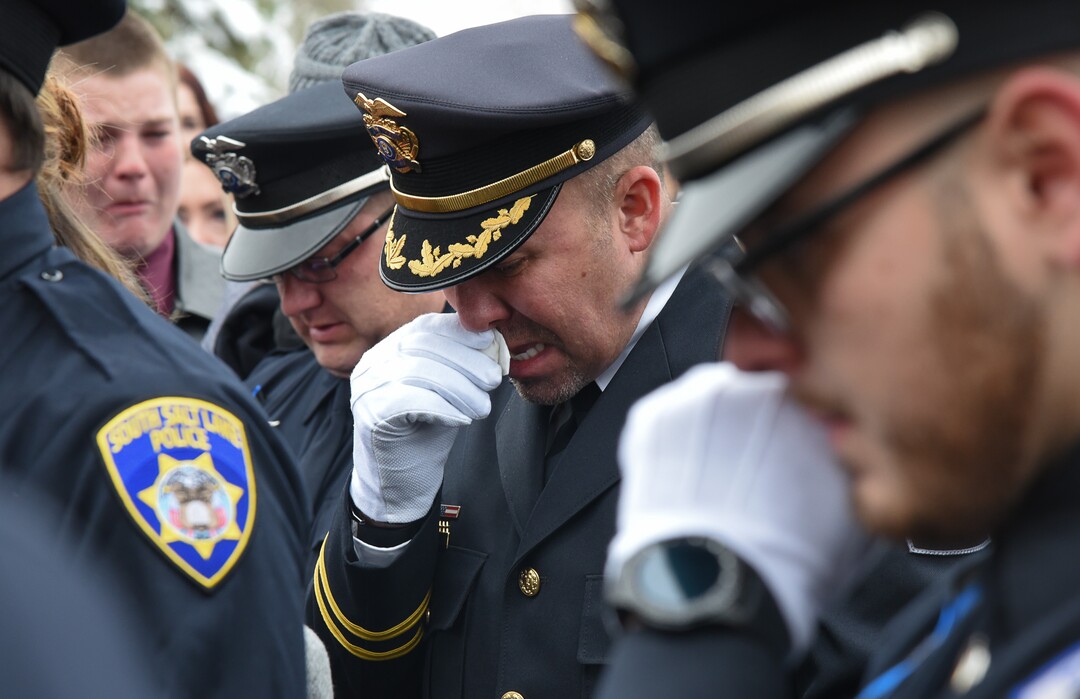 (Francisco Kjolseth  |  The Salt Lake Tribune)  Hundreds of police officers attend funeral services for fellow officer  David Romrell at Larkin Sunset Gardens Cemetery in Sandy, Wed. Dec. 5, 2018.