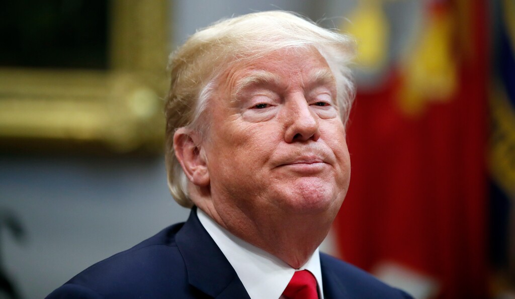 President Donald Trump pauses while speaking during a discussion for drug-free communities support programs, in the Roosevelt Room of the White House, Wednesday, Aug. 29, 2018, in Washington. (AP Photo/Alex Brandon)