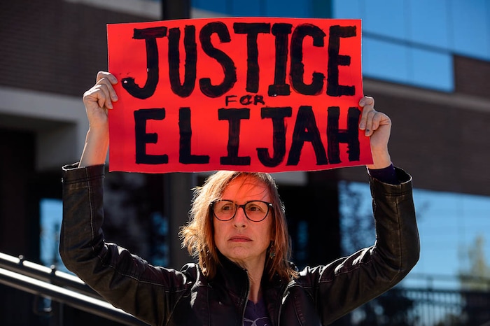 (Trent Nelson | The Salt Lake Tribune)
Utah Against Police Brutality holds a rally in front of West Valley City Hall, Saturday April 21, 2018. Elijah Smith was killed by West Valley Police on April 8 after he ran from them into a home. They shot him in the home's garage, while one hand was in the air and the other, activists say, appeared to be coming up, too. After body camera footage was released, the group began to call for the officer's firing. Nora Somer.