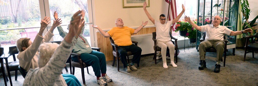 (Al Hartmann | The Salt Lake Tribune)
It's the 50th anniversary of Friendship Manor at 500 S. 1300 East in Salt Lake City. Seniors take in a sitting yoga and stretching exercise class in the mornings.