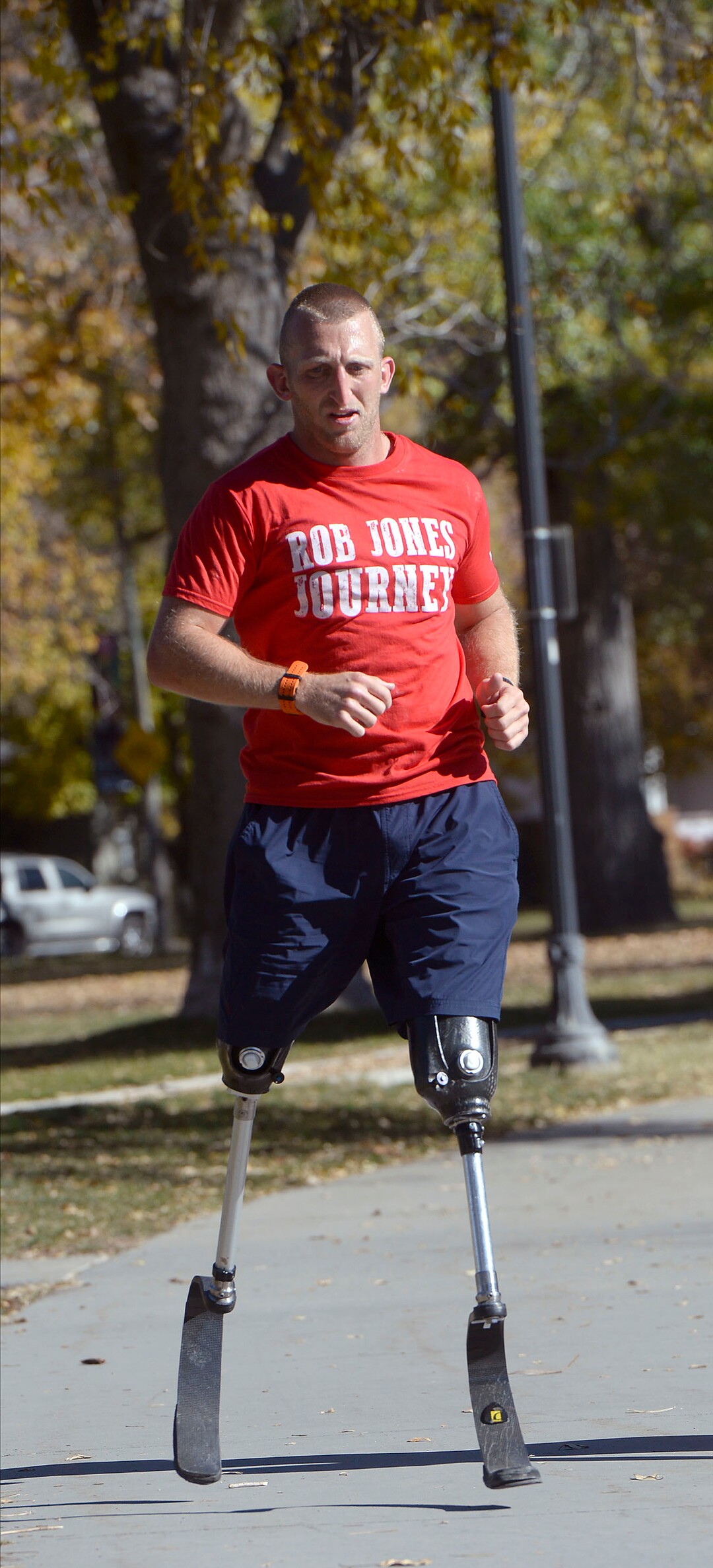 Al Hartmann  |  The Salt Lake Tribune) 	Rob Jones, a retired Marine Corps Sergeant who lost both legs when he stepped on an improvised explosive device in Afghanistan, runs a marathon, (26.2) miles in Liberty Park in Salt Lake City Wednesday Oct. 25. He won a Bronze Medal in the Paralympics and he wis the first and only double above the knee amputee to ride a normal bicycle 5,180 miles across America. Now, he is set to run 31 marathons in 31 days in 31 major cities. Starting in London on October 12th, and continuing in the United States and Toronto, he will run 26.2 miles in the selected city on his own, travel to the next city, and repeat, ending appropriately on Veterans Day in our Nation’s Capital.  His motto, “Survive. Recover. Live.” 