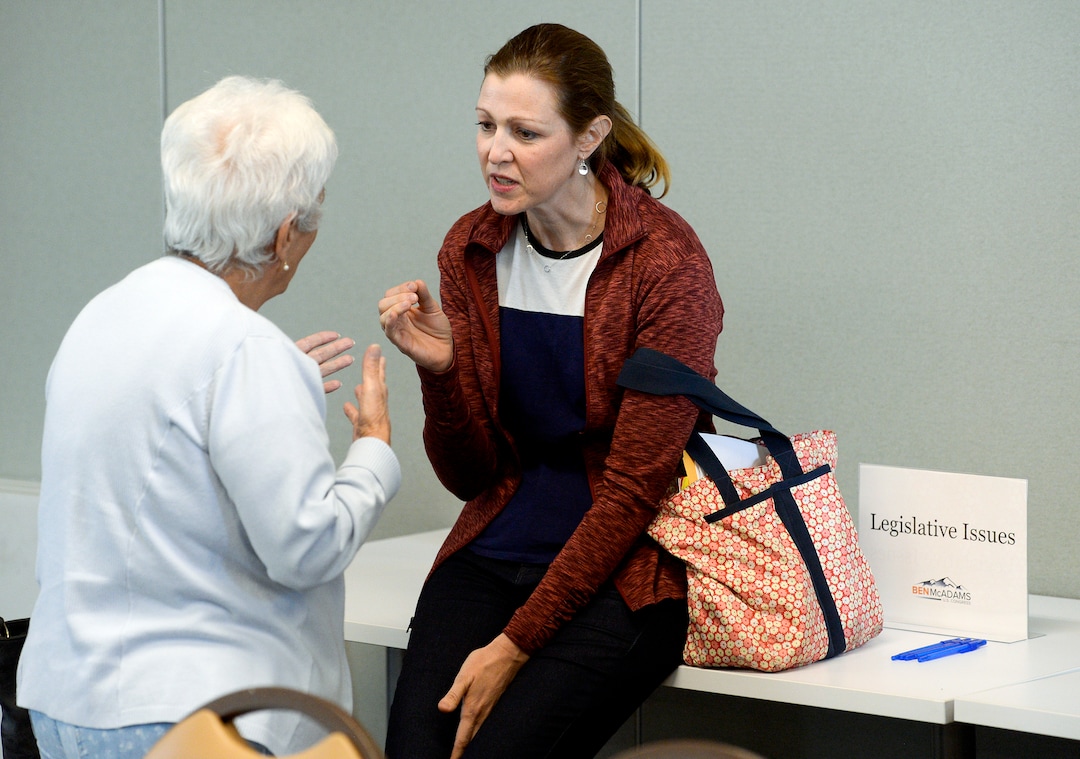 (Leah Hogsten  |  The Salt Lake Tribune)  l-r Cheri Groesbeck questions Julie McAdams regarding her husband, Rep. Ben McAdams' stance on impeachment. "I think it's time for him to stand up and be counted," said Groesbeck. McAdams reiterated his support for presidential oversight, but stopped short of saying whether an impeachment inquiry is justified or whether President Donald Trump's actions warrant removal from office. McAdams' Oct. 4, 2019 remarks came at the start of a gathering at the Midvale Senior Center.
