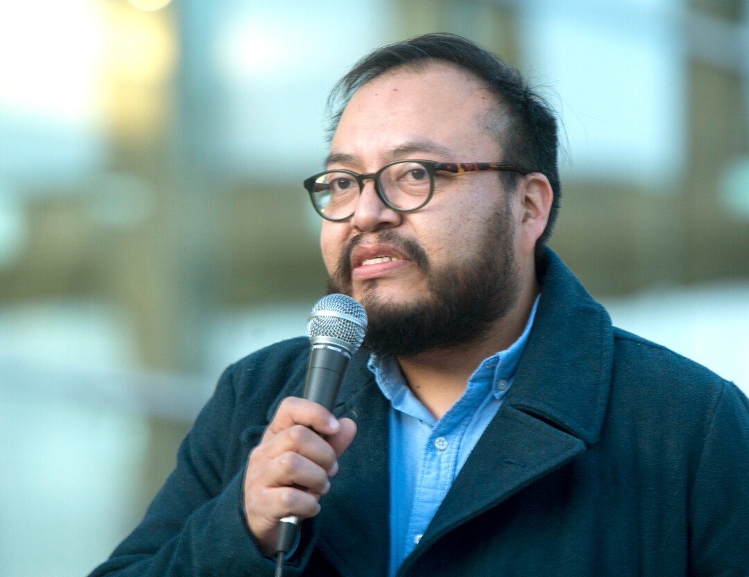 Moroni Benally welcomes the crowd to during the Indigenous Peoples Day celebration, hosted by the Utah League of Native American Voters and PANDOS (Peaceful Advocates for Native Dialogue and Organizing Support) at the Salt Lake City Library, Monday, October 9, 2017.