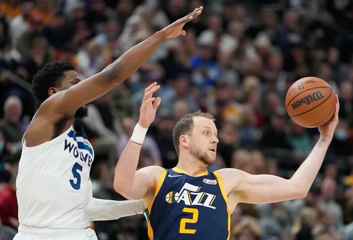 (Francisco Kjolseth | The Salt Lake Tribune) Minnesota Timberwolves guard Malik Beasley (5) defends Utah Jazz guard Joe Ingles (2) in NBA action between the Utah Jazz and the Minnesota Timberwolves at Vivint Smart Home Arena in Salt Lake City, Thursday, Dec. 23, 2021.