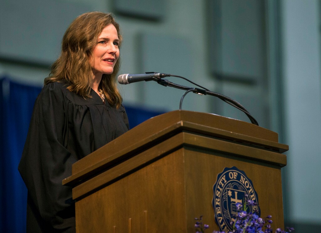 FILE - In this May 19, 2018 file photo, Amy Coney Barrett, United States Court of Appeals for the Seventh Circuit judge, speaks during the University of Notre Dame's Law School commencement ceremony at the University of Notre Dame in South Bend, Ind. Barrett is one of four judges thought to be President Donald Trump’s top contenders to fill a vacancy on the Supreme Court.  (Robert Franklin /South Bend Tribune via AP, File)