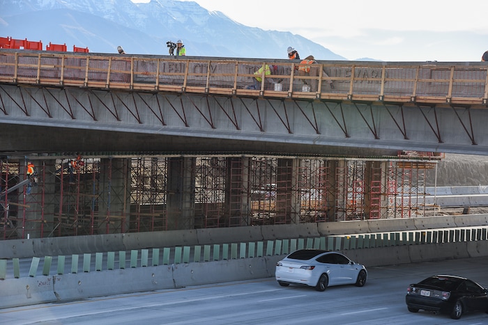 (Francisco Kjolseth  |  The Salt Lake Tribune)  UDOT completes the first stage of the new Triumph Blvd bridge in Lehi, opening East to West traffic on Thursday, Nov. 1, 2018, as part of the I-15 Technology Corridor Project.