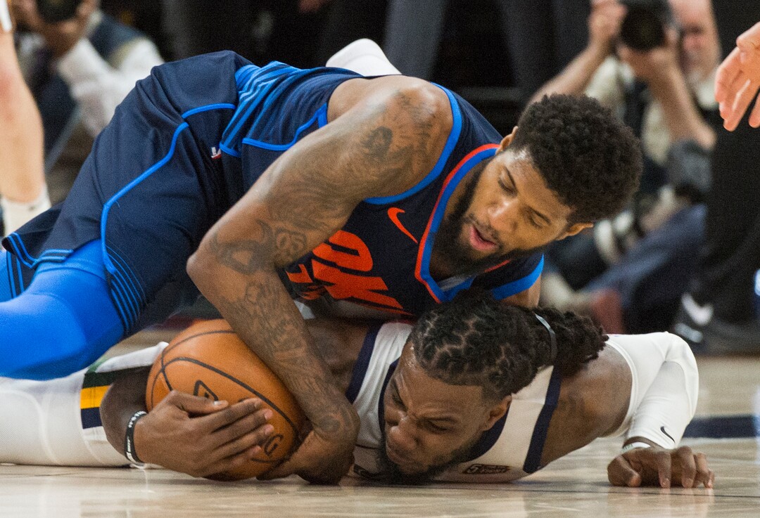 (Rick Egan  |  The Salt Lake Tribune)    Oklahoma City Thunder forward Paul George (13) goes for a loose ball along with Utah Jazz forward Jae Crowder (99), in game 4, NBA playoff action between Utah Jazz and Oklahoma City Thunder, in Salt Lake City, Monday April 23, 2018.