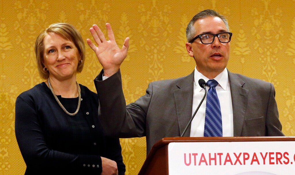 Sen. Dan McCay, R - Riverton, right, speaks as Rep. Karianne Lisonbee, R - Clearfield, looks on during the Utah Taxpayers Association 2019 legislative outlook conference Monday, Jan., 7, 2019, in Salt Lake City. Utah Gov. Gary Herbert is pitching his plan of adding new sales taxes while cutting the overall rate, an issue that could be contentious during the upcoming legislative session.Herbert told the Utah Taxpayers Association that economic changes have significantly narrowed the sales tax base, and now is the time to act. (AP Photo/Rick Bowmer)