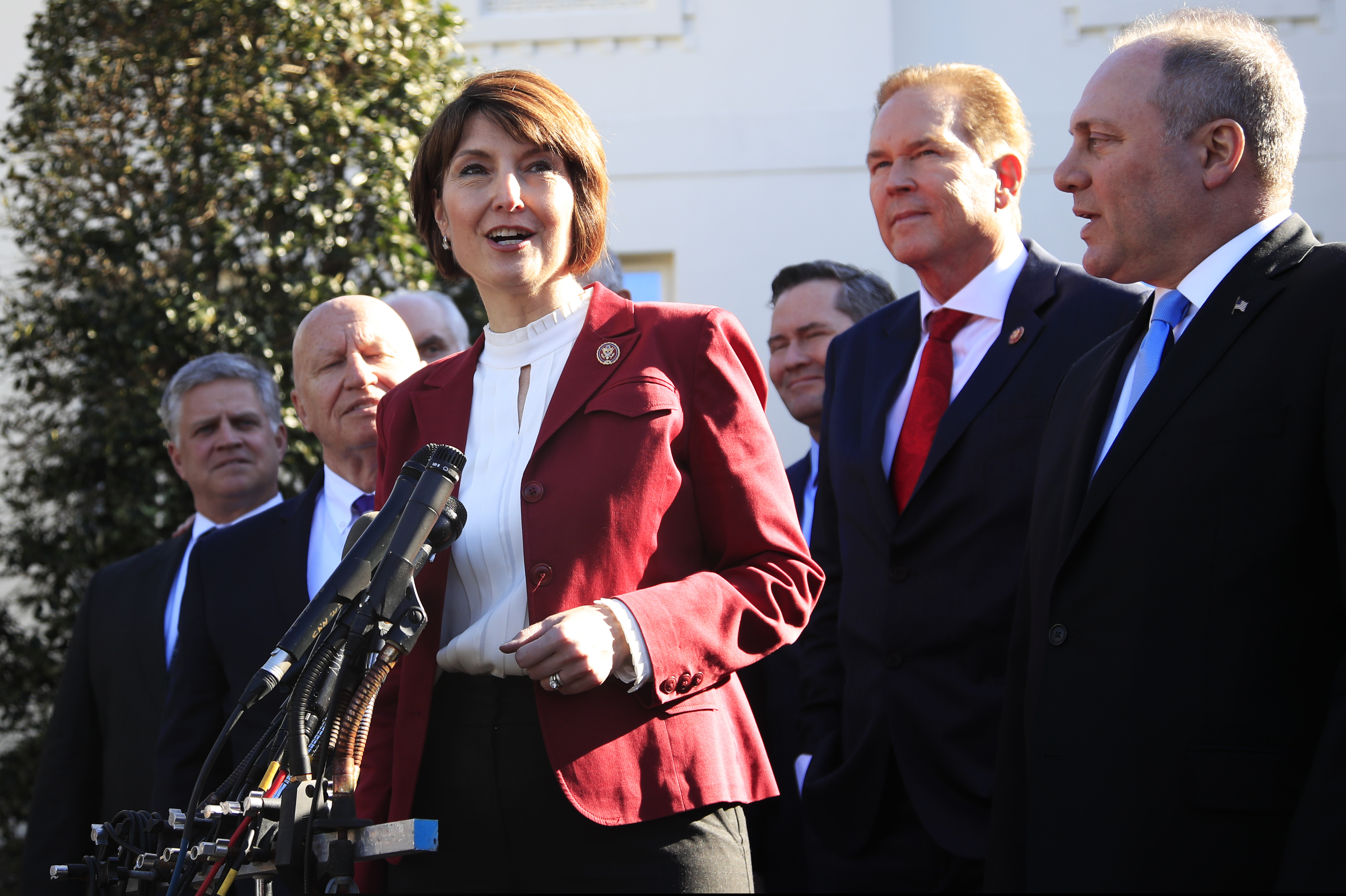 (Manuel Balce Ceneta | AP) Rep. Cathy McMorris Rodgers, R-Wa., together with Rep. Kevin Brady, R-Texas, left, Rep. Rep. Steve Scalise, R-La., right, Rep. Vern Buchanan, R-Fla., second from right, and other Republican members of Congress speaks to reporters outside the West Wing of the White House following a meeting with President Donald Trump at the White House in Washington, Tuesday, March 26, 2019.