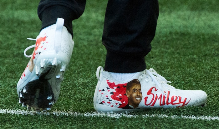 (Rick Egan  |  The Salt Lake Tribune)      Troy Williams wears custom made shoes that honor his grandmother Cookie, who passed away and Smiley is a nickname for his uncle, who also passed away. They were a gift to Troy and he wanted to wear them the during University of Utah's 2018 Pro Day for NFL scouts, at Spence Eccles Field House, Wednesday, March 28, 2018.