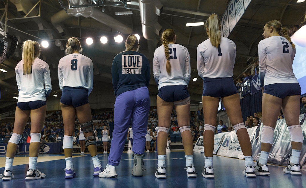 (Leah Hogsten | The Salt Lake Tribune) Players pause at the start of the volleyball match-up between Brigham Young University and Utah State University, September 1, 2022. 