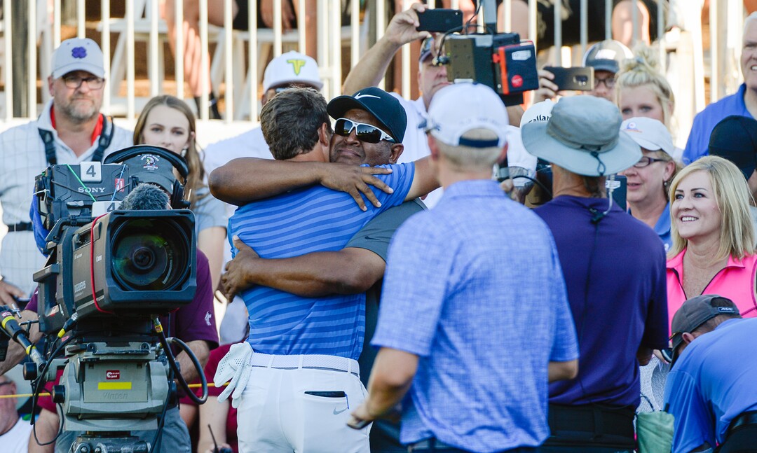 (Francisco Kjolseth  |  The Salt Lake Tribune)  Cameron Champ from Sacramento, CA, is embraced by his father Jeff after winning the Utah Championship golf event on the Web.com Tour at Oakridge Country Club in Farmington on Sunday, July 15, 2018.