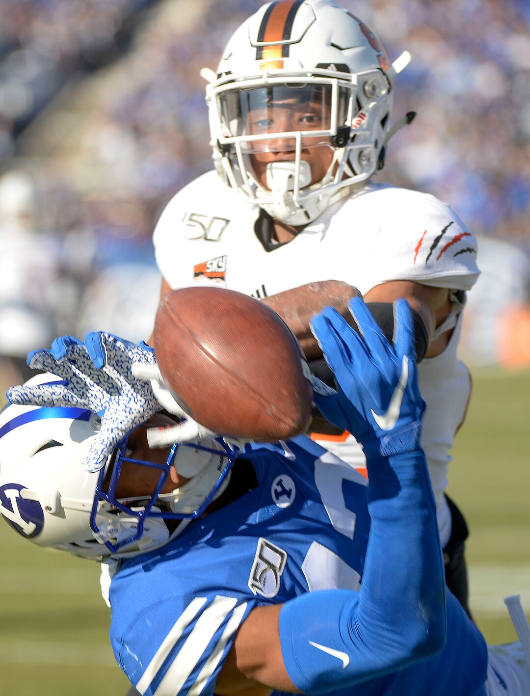 (Leah Hogsten  |  The Salt Lake Tribune) Brigham Young Cougars wide receiver Micah Simon (13) fails to pull in the pass with heavy coverage from Idaho State Bengals defensive back Caleb Brown (22) as Brigham Young University takes on Idaho State, Saturday, Nov. 16, 2019 at LaVell Edwards Stadium.
