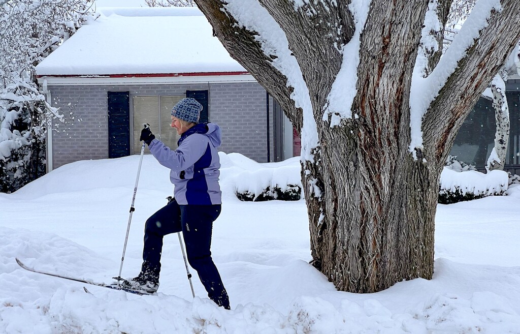 (Francisco Kjolseth | The Salt Lake Tribune) Jayde Prudden, a McGillis School teacher, takes advantage of a late start day because of snow to ski her neighborhood in Salt Lake City on Wednesday, April 5, 2023.