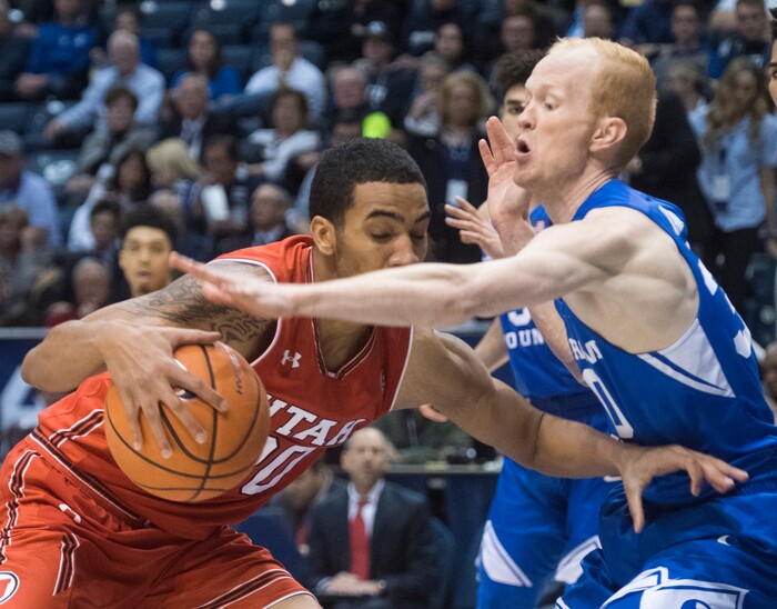 (Rick Egan  |  The Salt Lake Tribune)   Brigham Young Cougars guard TJ Haws (30) defends as Utah Utes guard Gabe Bealer (30) tries to take the ball to the hoop, in basketball action Utah Utes vs. Brigham Young Cougars at the Marriott Center in Provo, Saturday, December 15, 2017.


