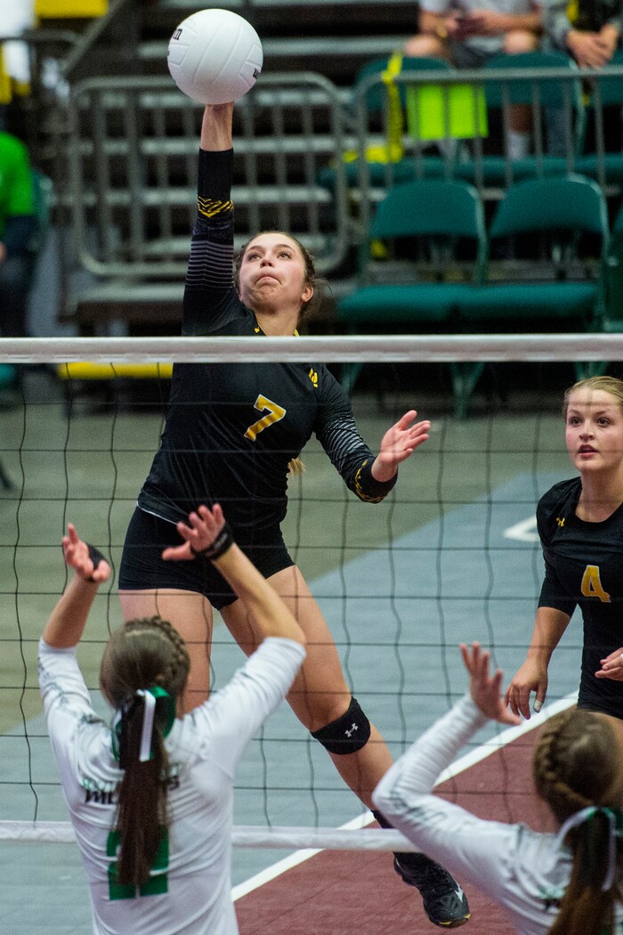 (Chris Detrick  |  The Salt Lake Tribune) Union's Marleigh Harrocks (7) spikes past South Summit's Jessa Gines (22) and South Summit's Kinley Gines (24)  during the 3A volleyball state quarterfinals at the UCCU Center at Utah Valley University Wednesday, October 25, 2017.  