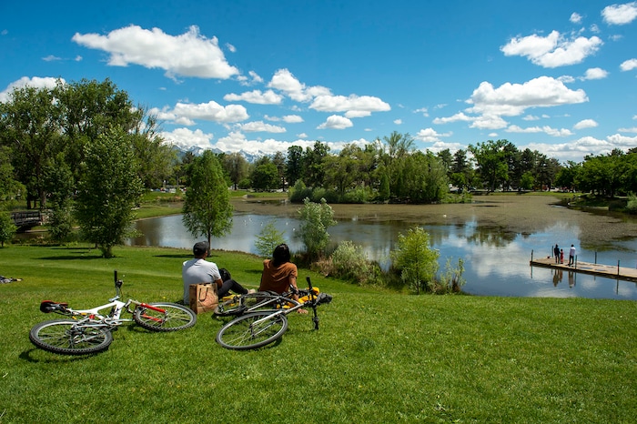 (Rick Egan  |  The Salt Lake Tribune)      Visitors enjoy a sunny afternoon at Liberty Park, Saturday, May 23, 2020.