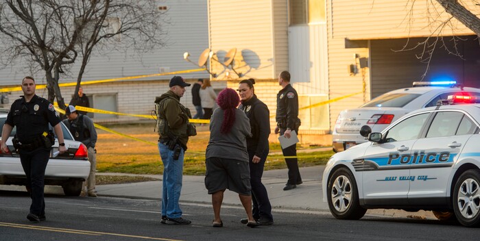 (Steve Griffin  |  The Salt Lake Tribune)  Police tape surrounds an apartment complex in West Valley City after three people were shot at an apartment complex at 3500 south Parkway Blvd. in West Valley City Tuesday Feb. 13, 2018.