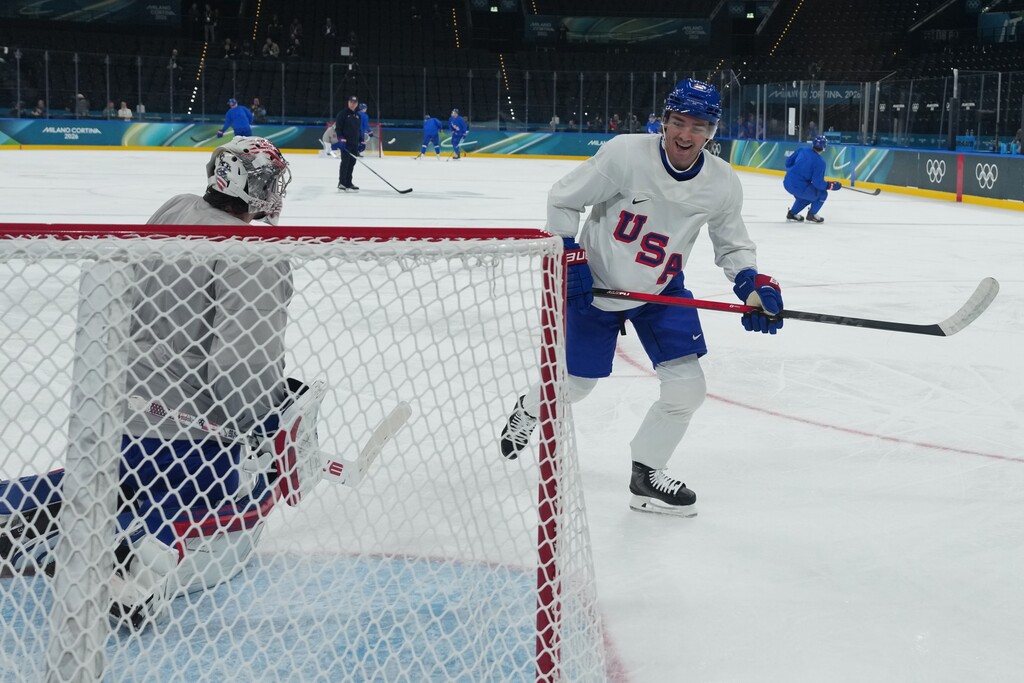 (Carolyn Kaster | AP) United States' Clayton Keller, right, during men's ice hockey practice at the 2026 Winter Olympics, in Milan, Italy, on Feb. 8, 2026. The Utah Mammoth captain is making his Olympic debut for the United States.