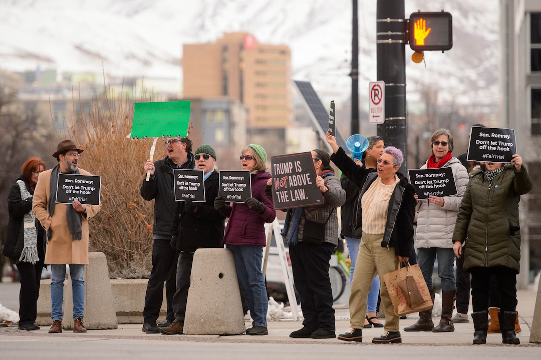(Trent Nelson  |  The Salt Lake Tribune) A coalition of progressive groups gathers Thursday outside the federal building in Salt Lake City on Thursday, Jan. 16, 2020 to push for a fair and impartial Senate impeachment hearing against President Donald Trump.