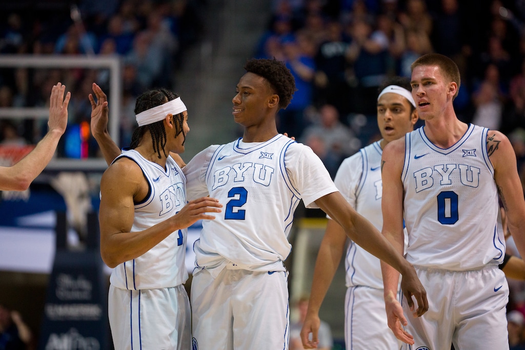 (Trent Nelson  |  The Salt Lake Tribune) Brigham Young Cougars guard Jaxson Robinson (2) celebrates a three-pointer as BYU hosts University of Central Florida, NCAA basketball in Provo on Tuesday, Feb. 13, 2024.