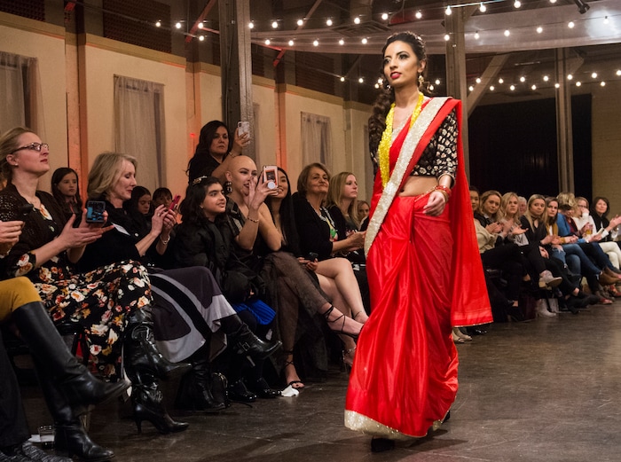 (Rick Egan  |  The Salt Lake Tribune) Aarati Ghimire from Nepal, walks the runwayat the 8th Annual Women of the World Fashion Show. The fashion show fund is raiser for the non-profit that seeks to help refugees settle in a new culture. Wednesday, March 7, 2018.