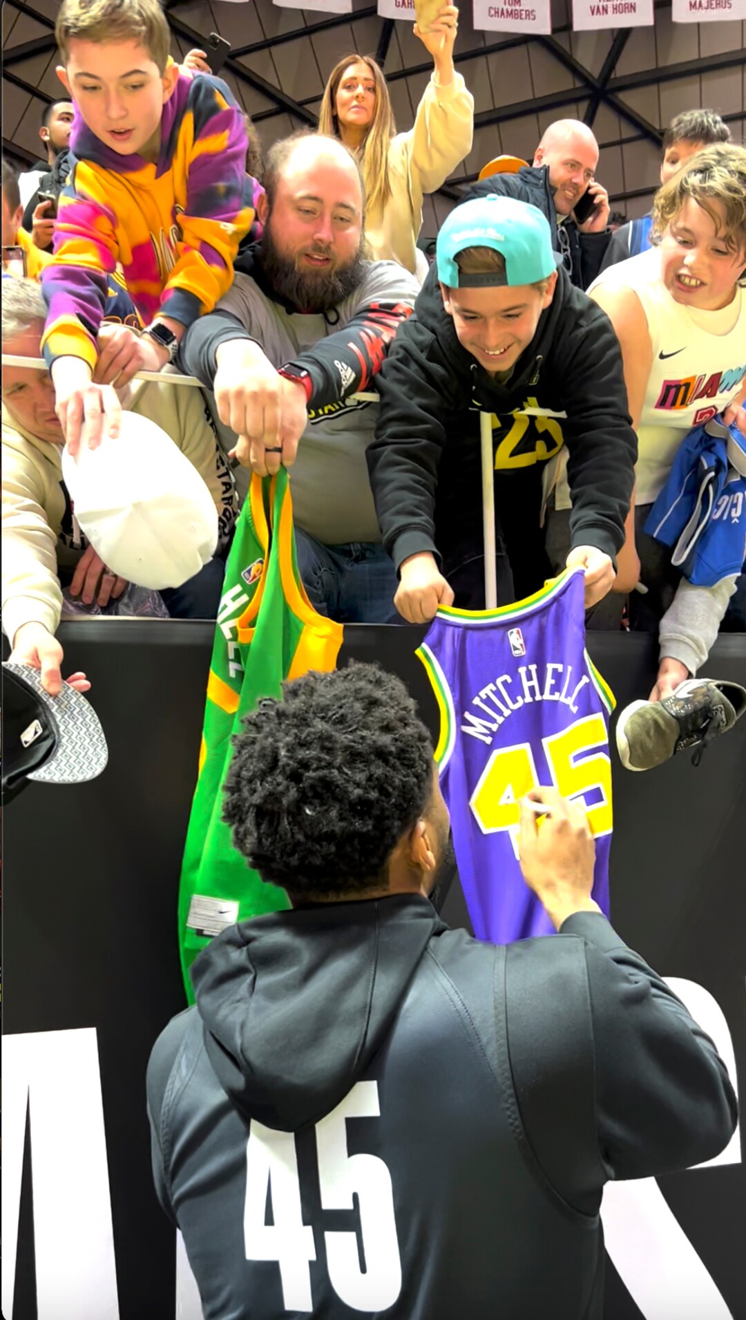 (Rick Egan | The Salt Lake Tribune) Donovan Mitchell signs autographs during the All-Star Practice at the Jon M. Huntsman Center, on Saturday, Feb. 18, 2023.