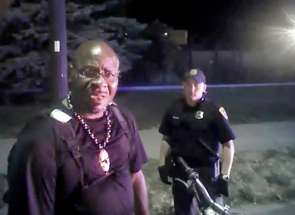 (Salt Lake City Police Department via AP) This Aug. 13, 2017, file photo from Salt Lake City police body camera video shows Patrick Harmon, left, before he was shot and killed in Salt Lake City.
