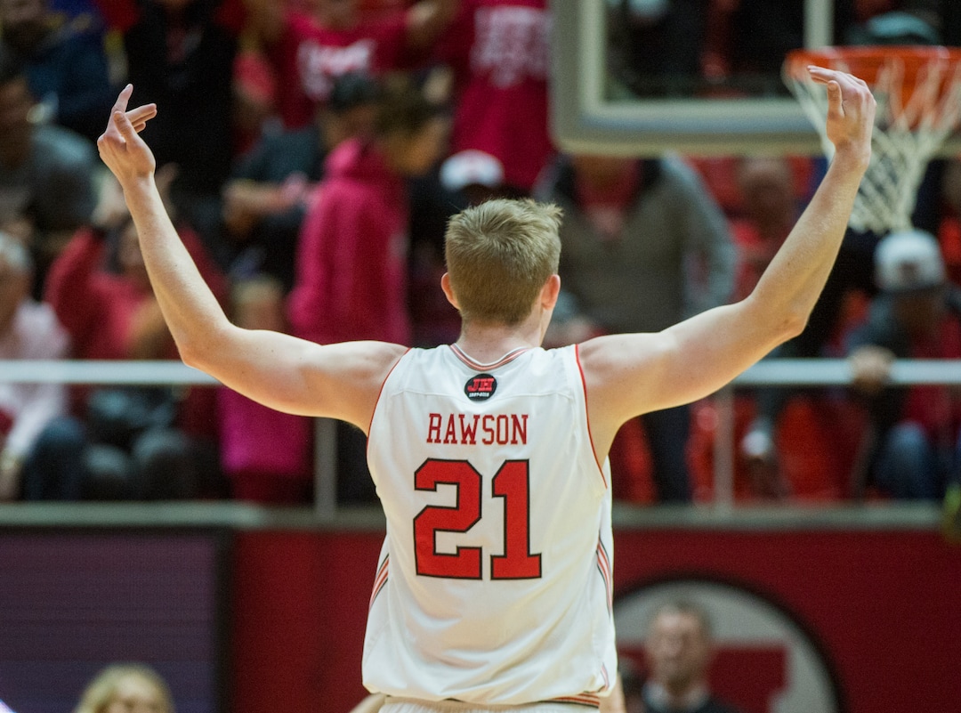 (Rick Egan  |  The Salt Lake Tribune)    Utah Utes forward Tyler Rawson (21) celebrates as the Utes take a 27-9 lead in the first quarter, in NIT playoff action between Utah Utes and LSU Tigers at the Jon M. Huntsman Center, Monday, March 19, 2018.