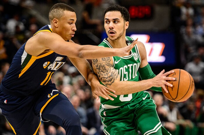 (Trent Nelson | The Salt Lake Tribune)  
Utah Jazz vs. Boston Celtics, NBA basketball in Salt Lake City, Wednesday March 28, 2018. Utah Jazz guard Dante Exum (11) defends Boston Celtics guard Shane Larkin (8).