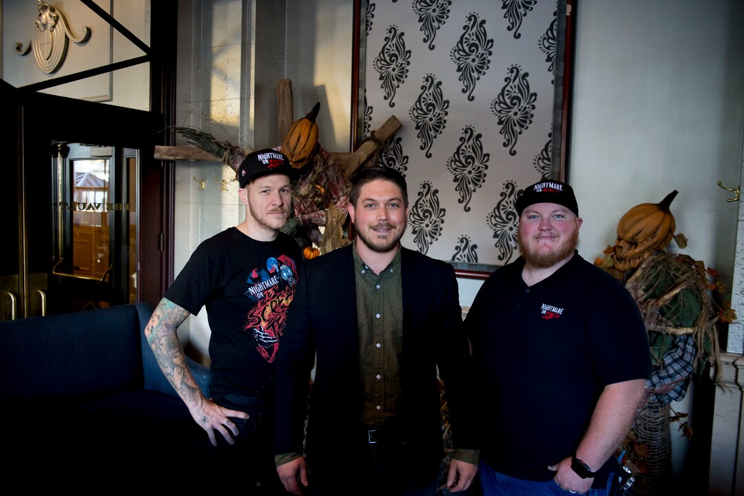 (Jeremy Harmon  |  The Salt Lake Tribune) Tommy Girbach, of Hotel Monaco, is seen with Jimmy Dilley, left, and Jake Mabey, of Nightmare on 13th haunted house at the Vault Bar at Hotel Monaco on Tuesday, Oct. 15, 2019. The downtown Salt Lake City bar has partnered with Nightmare on 13th to create a Halloween themed experience for bar patrons.