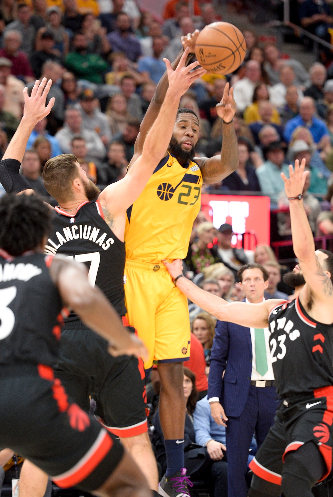 Leah Hogsten  |  The Salt Lake Tribune  Utah Jazz forward Royce O'Neale (23) gets the ball knocked out of his hands by Toronto Raptors center Jonas Valanciunas (17) as the Utah Jazz host the Toronto Raptors, Monday, Nov. 5, 2018 at  Vivint Smart Home Arena.