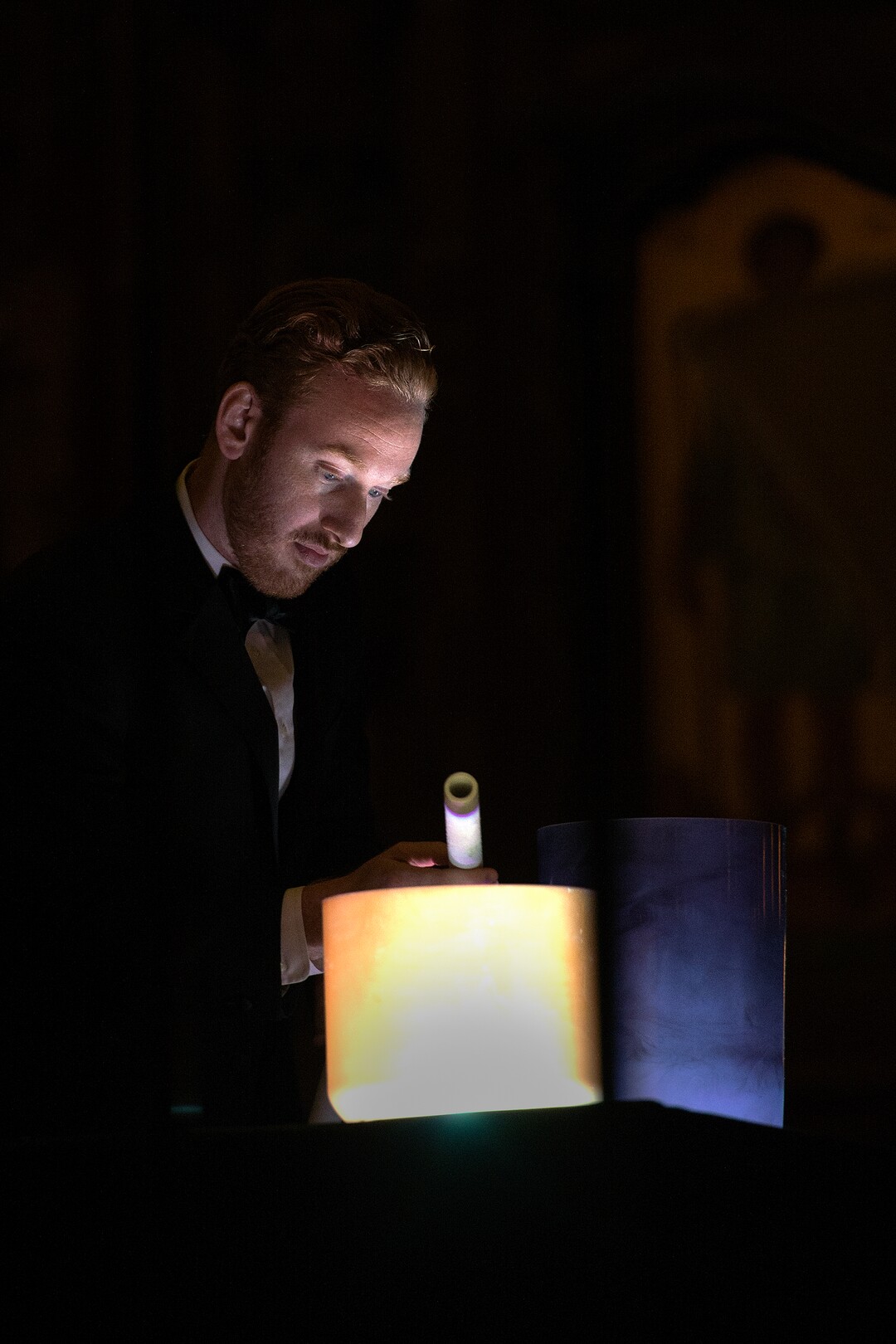 (Leah Hogsten  |  The Salt Lake Tribune) Michael Pape, a crystal bowl ringer with the Utah Chamber Artists, plays several singing bowls that are tuned to different frequencies during the group's annual Collage concert,  "In Memoriam," at the Cathedral of the Madeleine, Monday, Sept. 18, 2017.