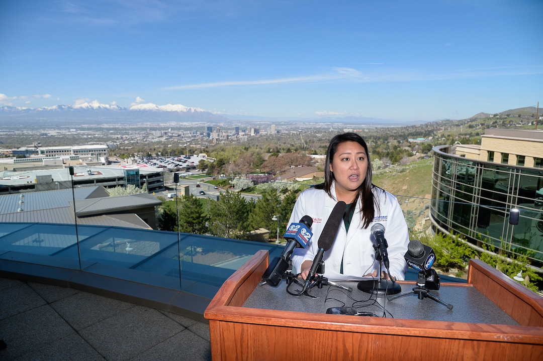 (Francisco Kjolseth  |  The Salt Lake Tribune)  Judy Ou, PhD, cancer epidemiologist at Huntsman Cancer Institute is framed by the Salt Lake valley on Tuesday, March 23, 2019, as she discusses a study conducted by researchers at HCI that indicates air pollution is a health risk for childhood cancer survivors.