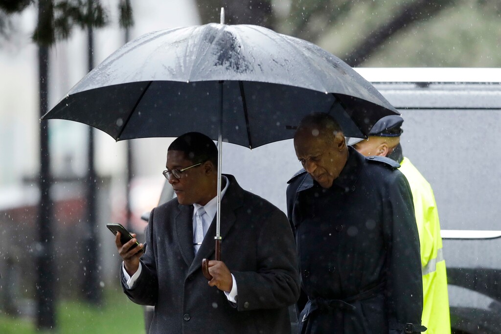 (AP Photo/Matt Slocum) Bill Cosby, right, arrives for his sexual assault trial, Monday, April 16, 2018, at the Montgomery County Courthouse in Norristown, Pa.