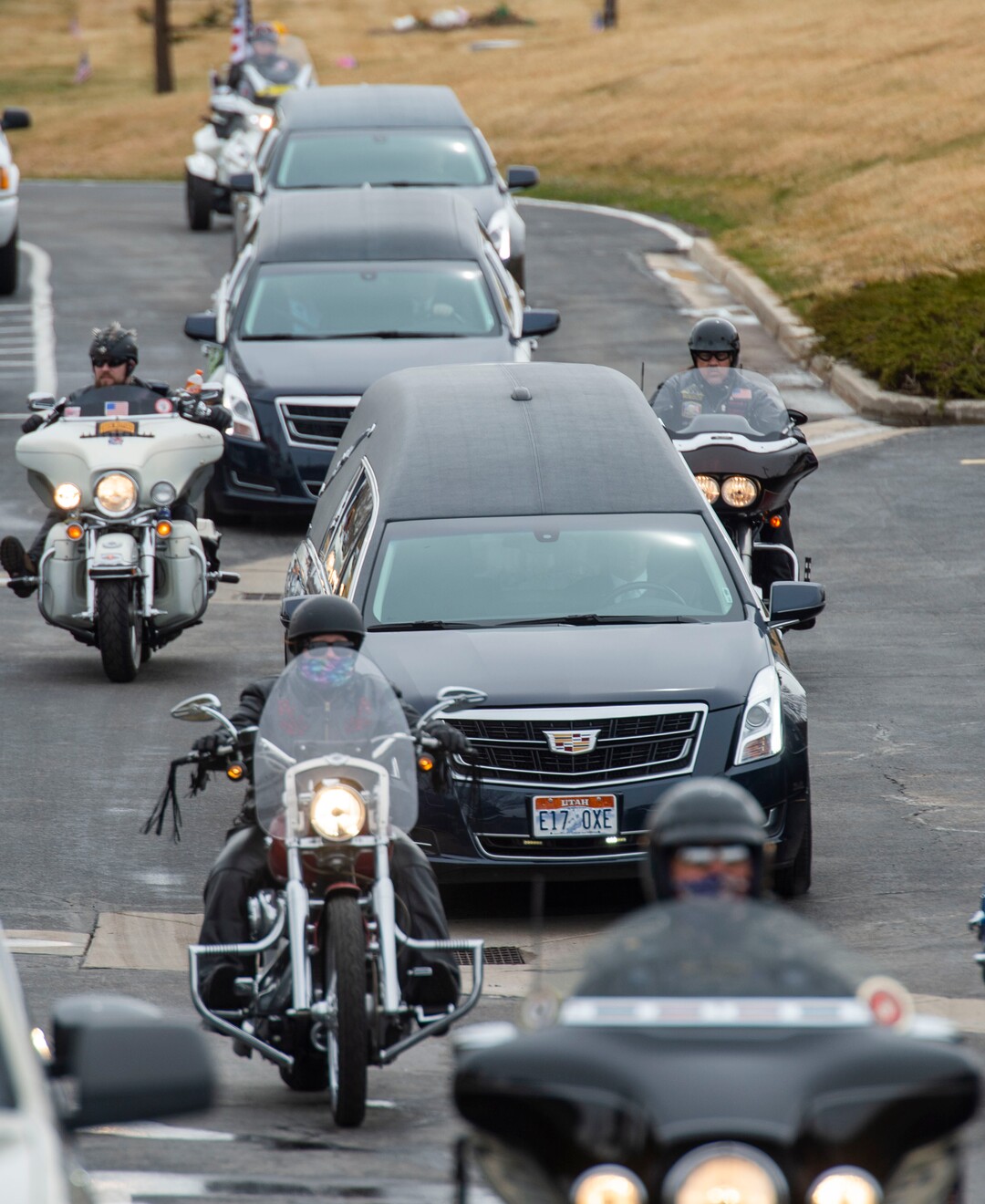 (Rick Egan  |  The Salt Lake Tribune)     The funeral processing for 2nd Lt. Lynn W. Hadfield, arrives at Veterans Memorial Park, in Bluffdale. Thursday, March 21, 2019.
