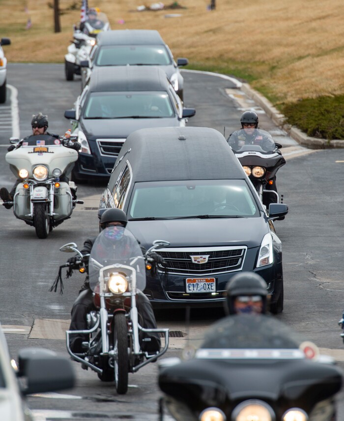 (Rick Egan  |  The Salt Lake Tribune)     The funeral processing for 2nd Lt. Lynn W. Hadfield, arrives at Veterans Memorial Park, in Bluffdale. Thursday, March 21, 2019.


