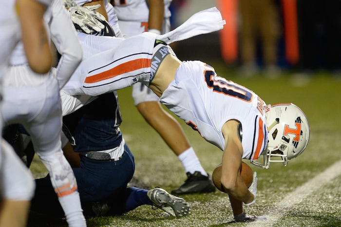 (Francisco Kjolseth  |  The Salt Lake Tribune)  Timpview's Payton Madson runs the ball in game action between Timpview at Corner Canyon on Thursday, Sept. 21, 2017.