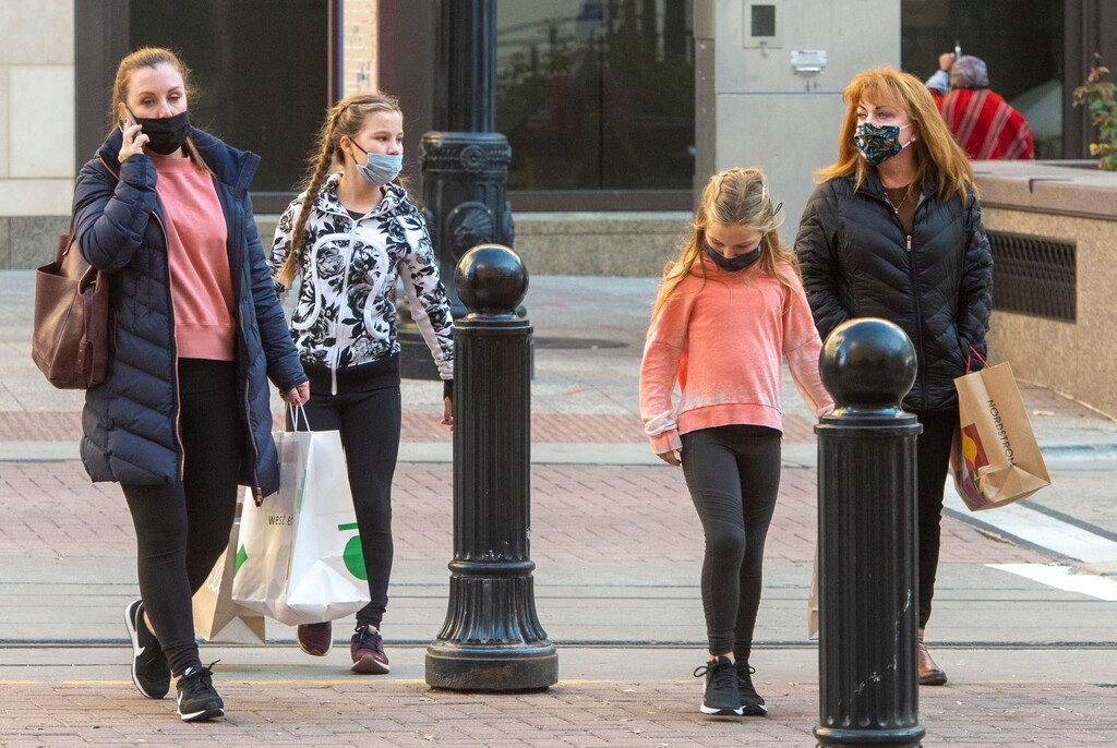 (Rick Egan | The Salt Lake Tribune) Shoppers and commuters wear masks in downtown Salt Lake City, Monday, Nov. 30, 2020.