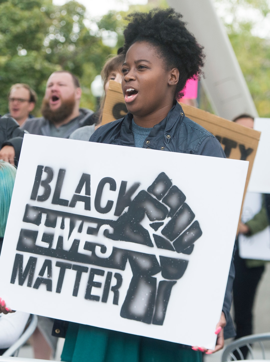 (Rick Egan  |  The Salt Lake Tribune)  Natalie Pinckney chants during a Black Lives Matter protest against police brutality. The protesters are calling for the release of body camera footage of an officer fatally shooting 50-year-old Patrick Harmon at the Salt Lake City Public Safety Building, Saturday, September 30, 2017.