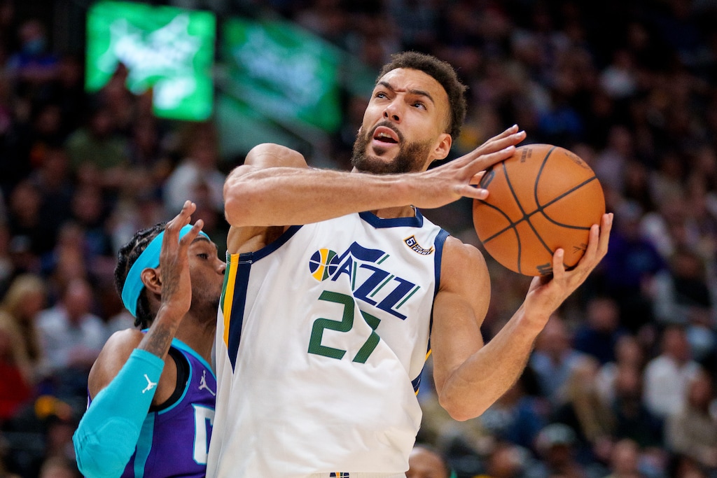 (Trent Nelson  |  The Salt Lake Tribune) Utah Jazz center Rudy Gobert (27) defended by Charlotte Hornets forward Jalen McDaniels (6) as the Utah Jazz host the Charlotte Hornets, NBA basketball in Salt Lake City on Monday, Dec. 20, 2021.