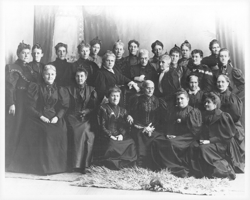 ( The Salt Lake Tribune file photo ) Susan B. Anthony and the Rev. Anna Howard Shaw, national suffrage leaders, met with Utah suffrage leaders in 1895. Anthony is seated third from the right; and Shaw has her hand on Anthony's chair; next to her is Sarah Granger Kimball, then Emmeline B. Wells and Zina Diantha Young (seated), who was general president of the Relief Society when this photo was taken.