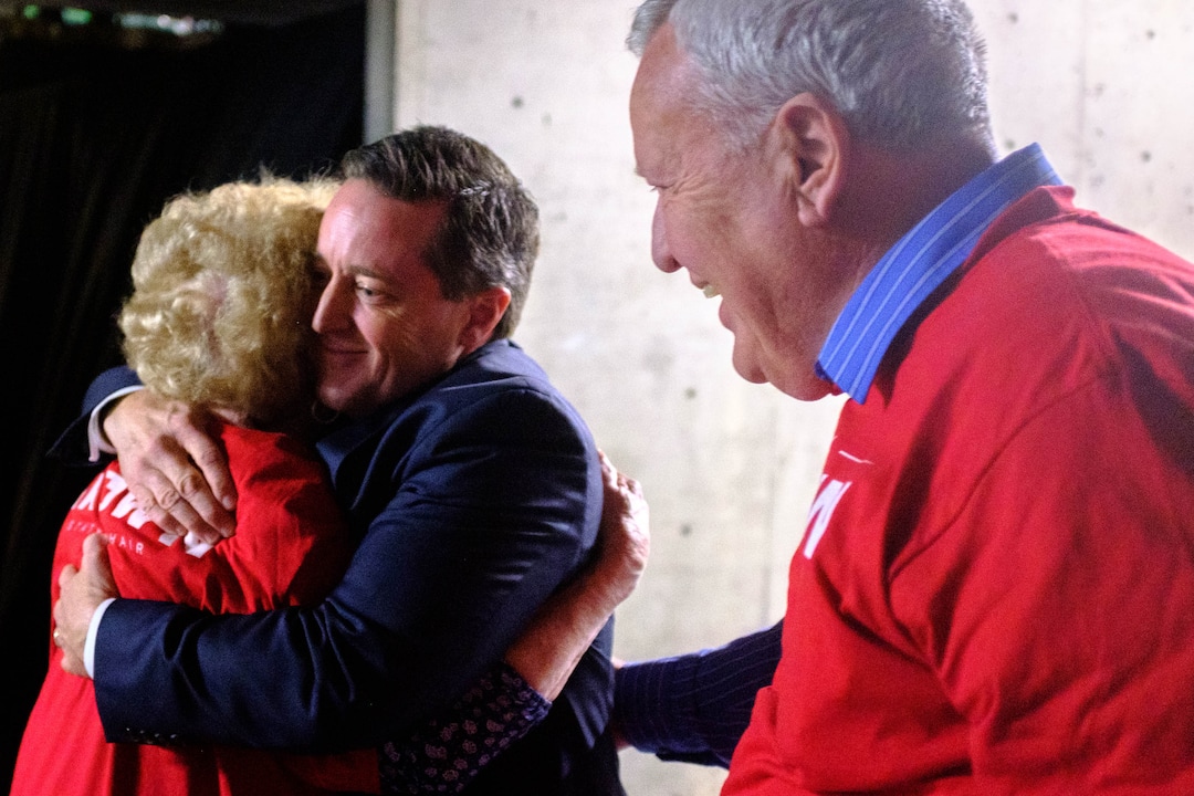 (Trent Nelson  |  The Salt Lake Tribune)  Derek Brown embraces his mother Linda Brown after winning the election for State Party Chair at the Utah Republican Party's 2019 Organizing Convention at Utah Valley University in Orem on Saturday May 4, 2019. At right is Brown's father Rodger Brown.
