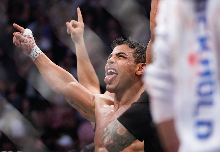(Francisco Kjolseth | The Salt Lake Tribune) No. 6 ranked middleweight Paulo Costa of Brazil, celebrates his win over former middleweight champion Luke Rockhold of the United States during their UFC 278 mixed martial arts bout in the octagon at Vivint Arena in Salt Lake City on Saturday, Aug. 20, 2022. 

